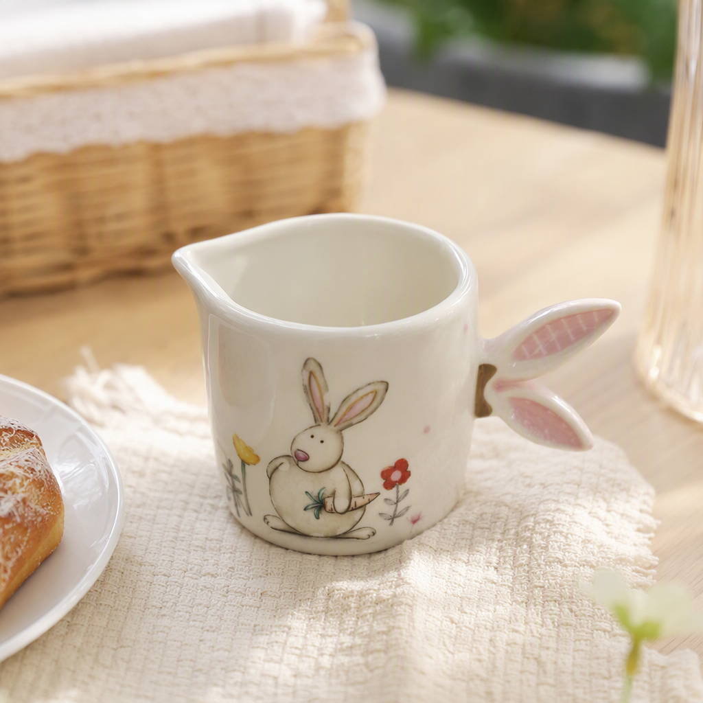 The white ceramic rabbit-ear small milk pot is a creative home coffee and milk pot. It's a cute and fun breakfast essential item details Picture
