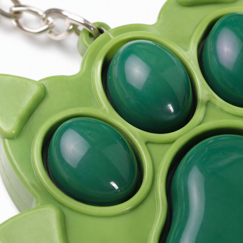 Creative green claw print-shaped press-type toy keychain, a cute and portable cartoon gift for children Application Scenario