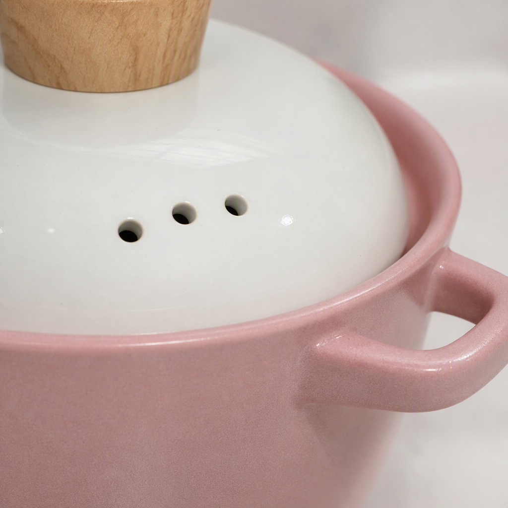 Pink ceramic clay pot with white lid and wooden handle, household stewing pot kitchenware, heat-resistant and durable Application Scenario