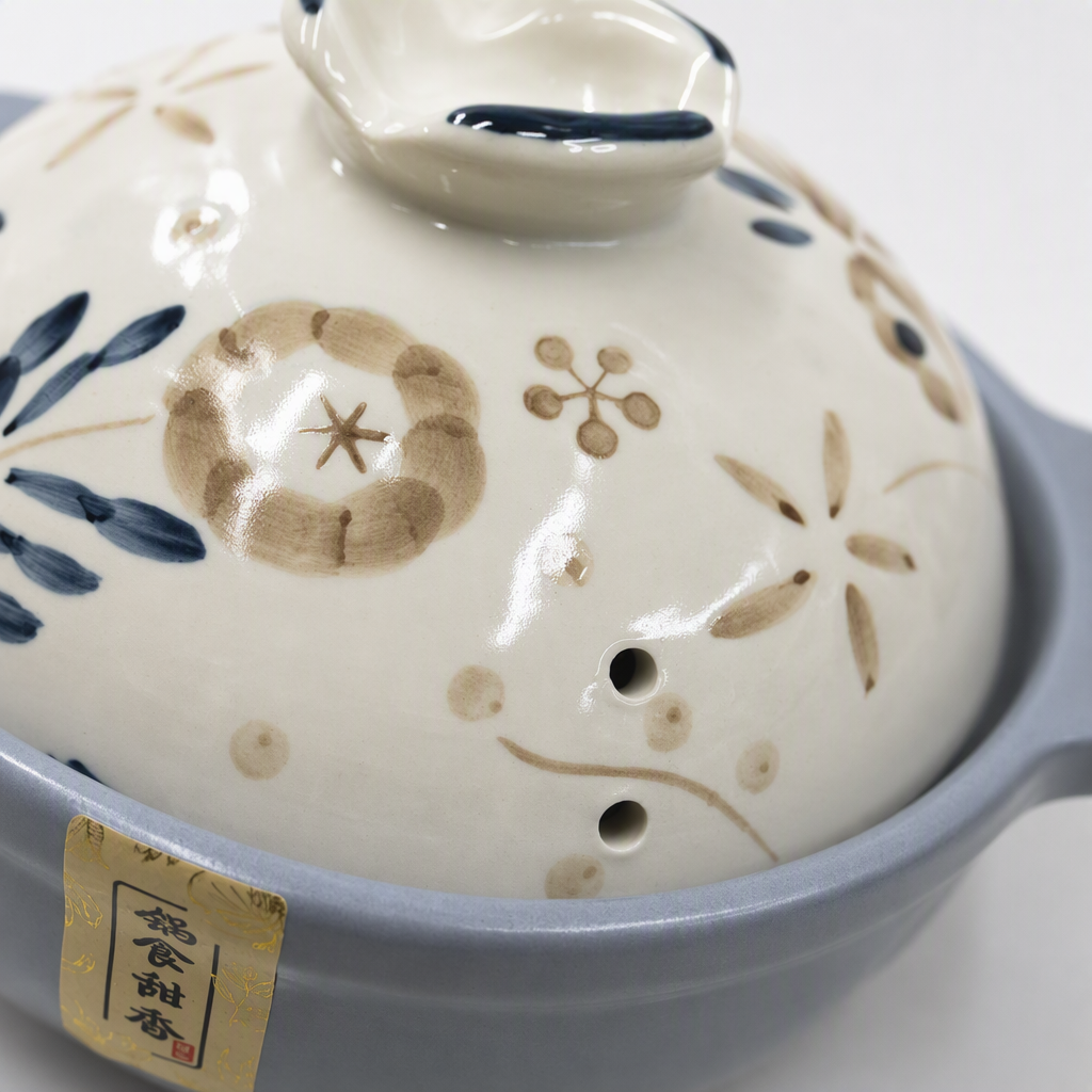 Blue-gray ceramic pot with floral pattern lid, heat-resistant and non-stick, kitchen stewing soup pot, household cookware Application Scenario
