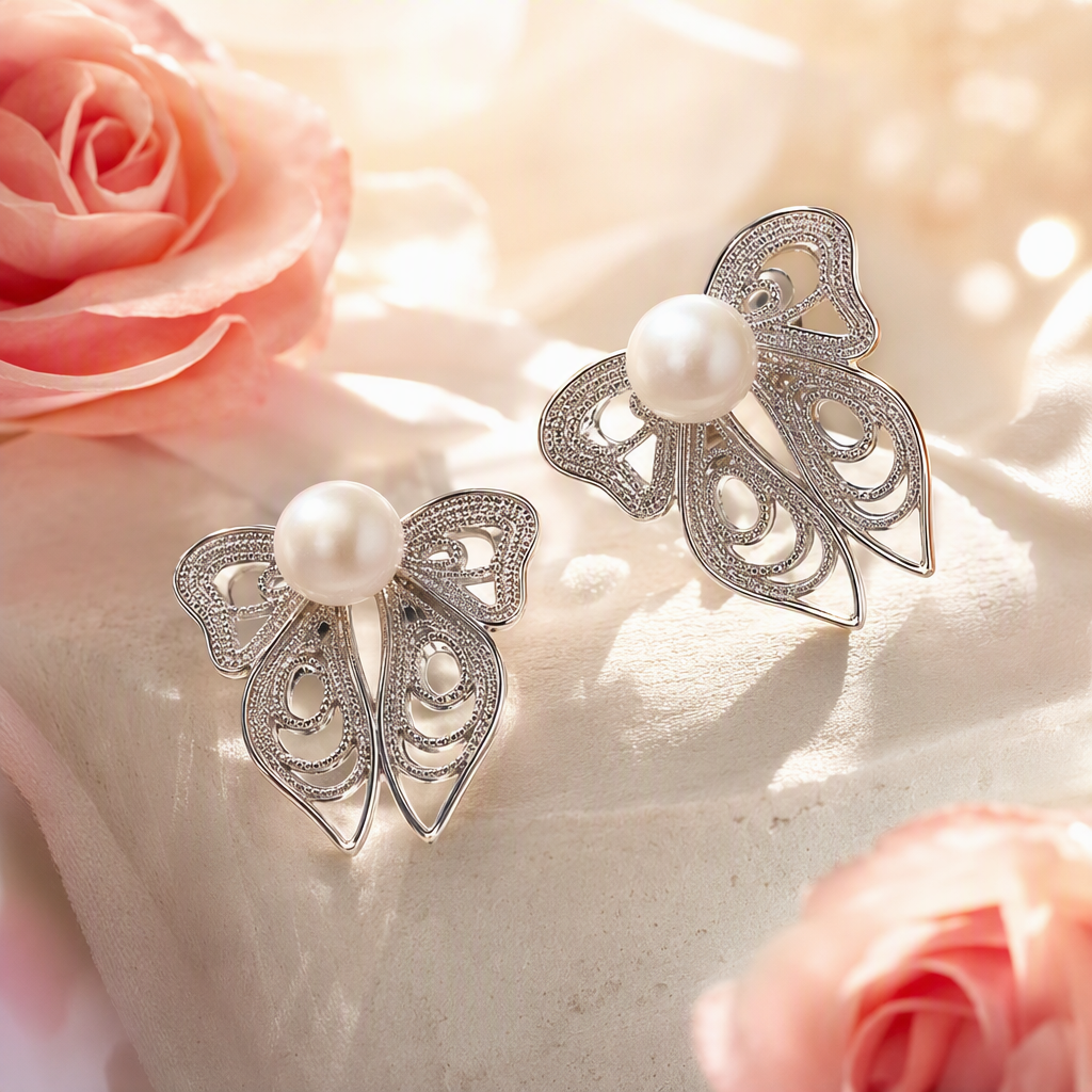 Caja de joyería blanca en forma de mariposa de plata perlas pendientes simple elegante moda orejas estilo de mujer regalo Specification image