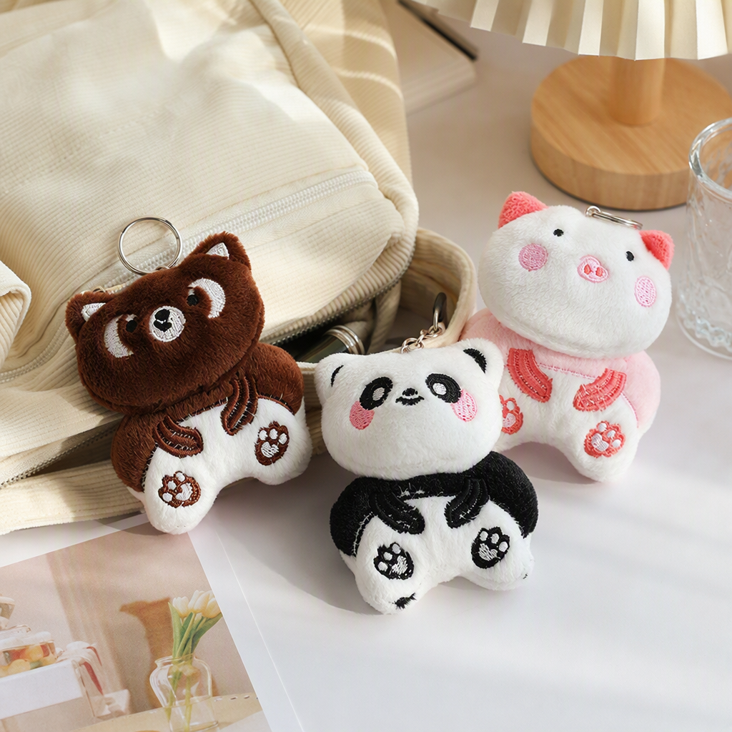 Chengdu Panda Cultural and Creative sitting figurines, plush toys, souvenirs, keychains, pendants, wholesale for foreign trade, cute cards, adorable plush animals, keychains, three-piece sets, panda and piggy pendants, Mother's Day gifts, creative cartoon keychains, accessories details Picture