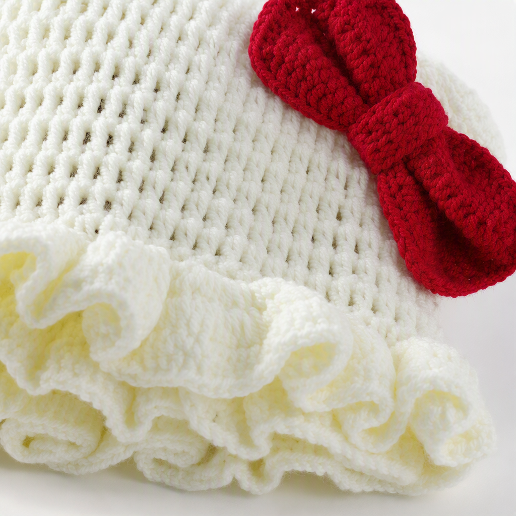 A cute winter warm woolen hat with white crochet cat ears and a red bow, a trendy and versatile Korean style for girls Application Scenario