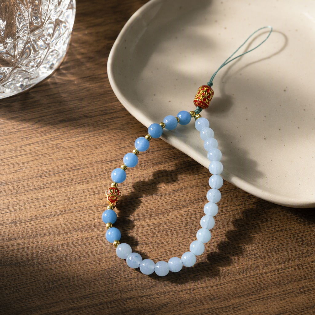 Blue beaded mobile phone lanyard with red gold edge decorative small beast pendant, fashionable and trendy accessory gift details Picture