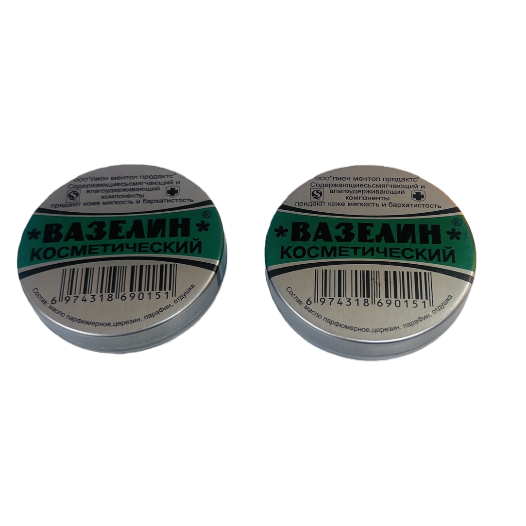 Two cans of Vaseline cosmetic moisturizing, hydrating, repairing and skin care products with a green label in a silver iron box Application Scenario