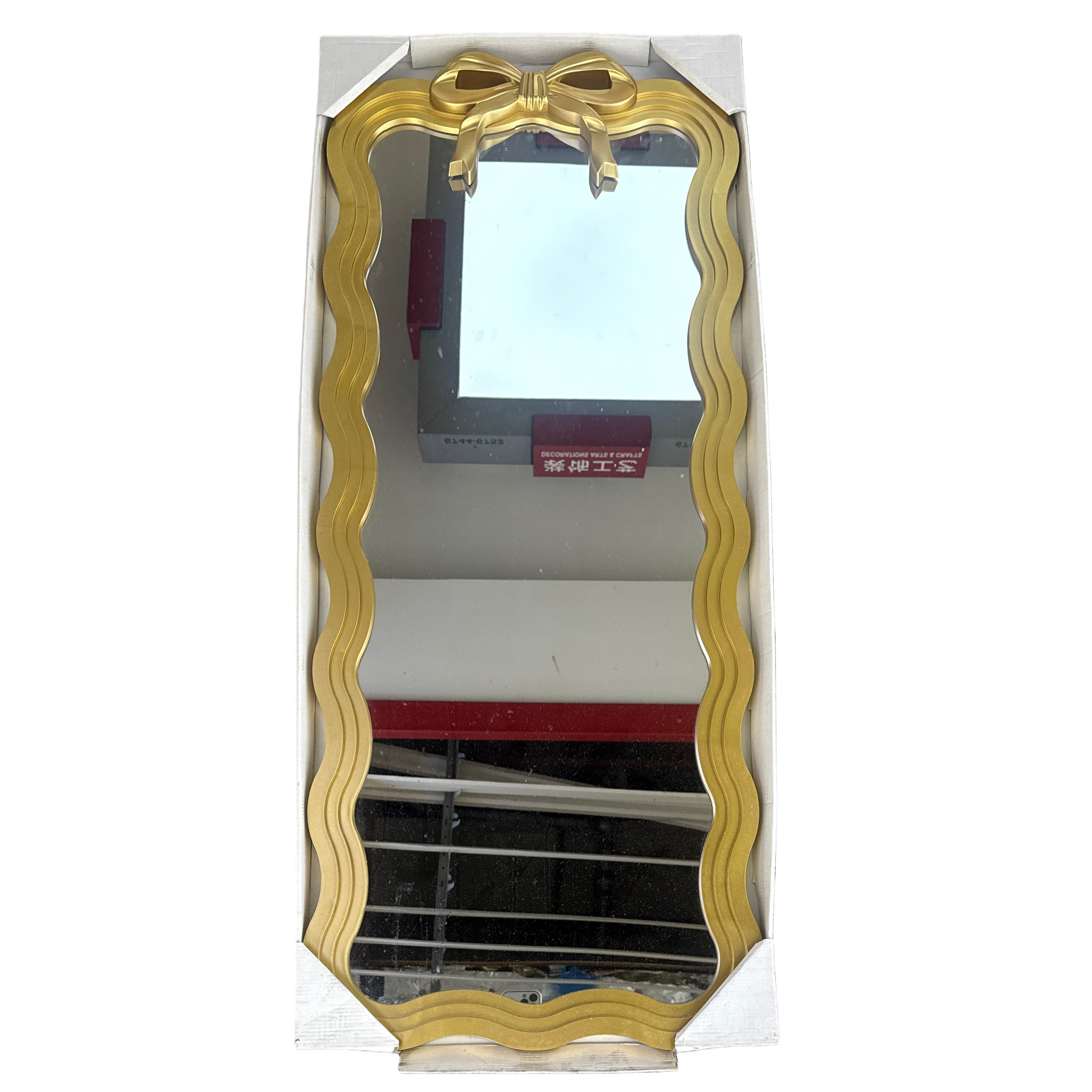 A golden wavy border with a bow decorative mirror, a fashionable and simple home decoration, a bedroom dressing mirror ornament Item Picture
