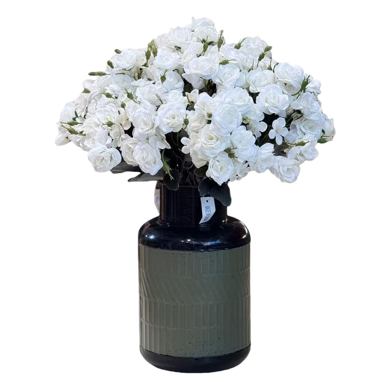 A romantic flower arrangement with a white rose bouquet paired with a dark green-textured glass vase decorates the home decor Item Picture