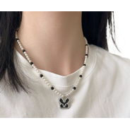 The stainless steel pendant with butterfly decoration on the necklace and the devil's eye Buddhist accessory are fashionable and versatile Item Picture
