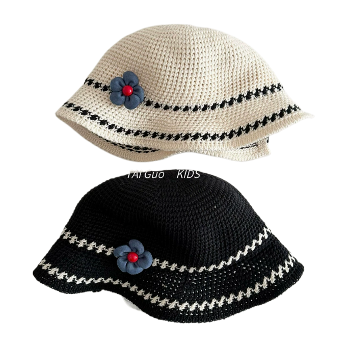 Summer children's stylish flower-knitted cap with a wide open brim for breathability and sun protection. Girls' stylish striped fisherman's hat