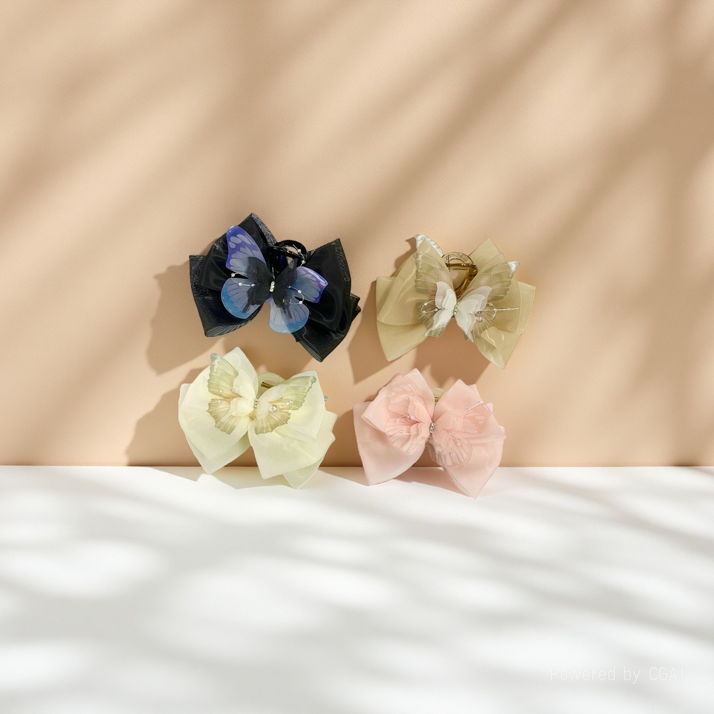 A sweet and cute netted bow clip, a small shark clip hair accessory at the back of a woman's head Specification image