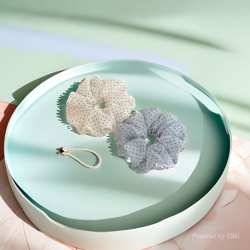 The Korean-style polka dot wrinkled checkered large intestine hair band exudes a fresh and sweet charm. It is fashionable with a hair tie and bun hairstyle