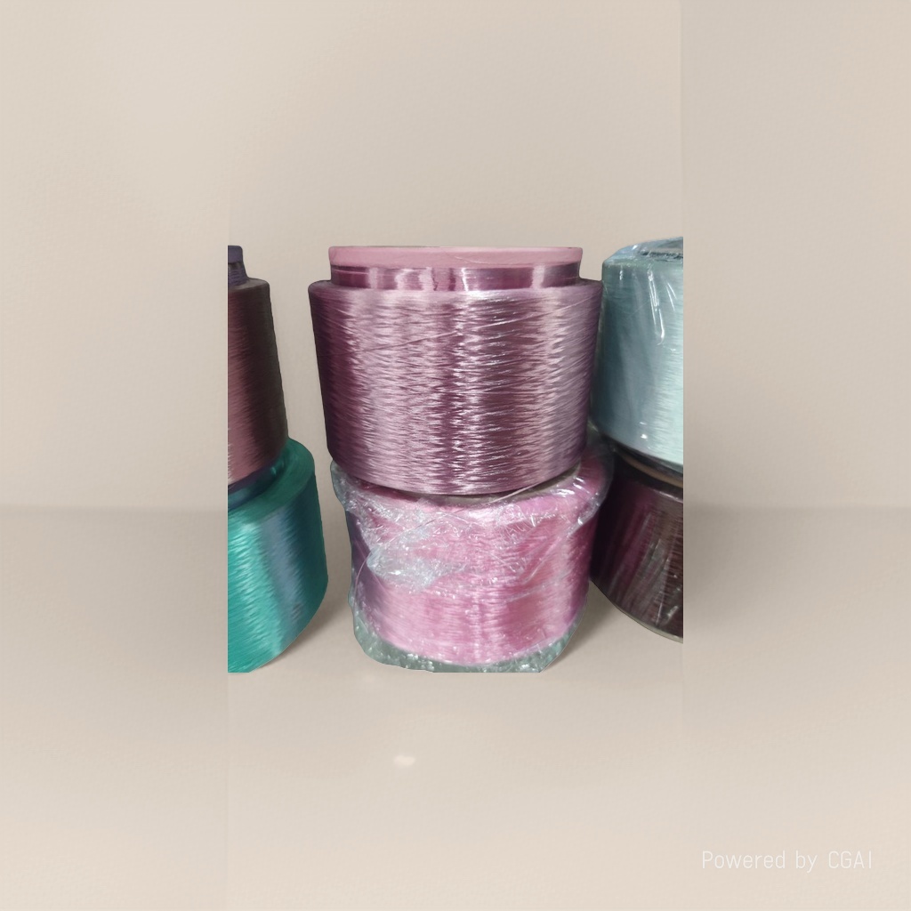 Purple silk thread is rolled with other yarns for weaving and embroidery, featuring high brightness, flexibility and tensile resistance Specification image