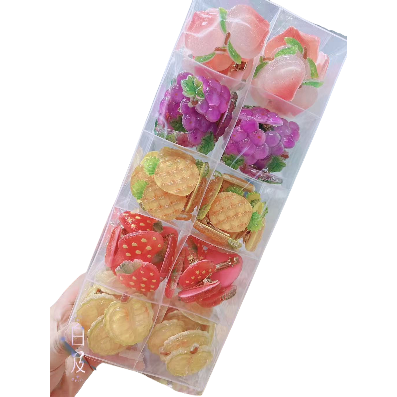 The transparent fruit-shaped children's hairpin storage box with compartmentalized design is suitable for cross-border use Item Picture