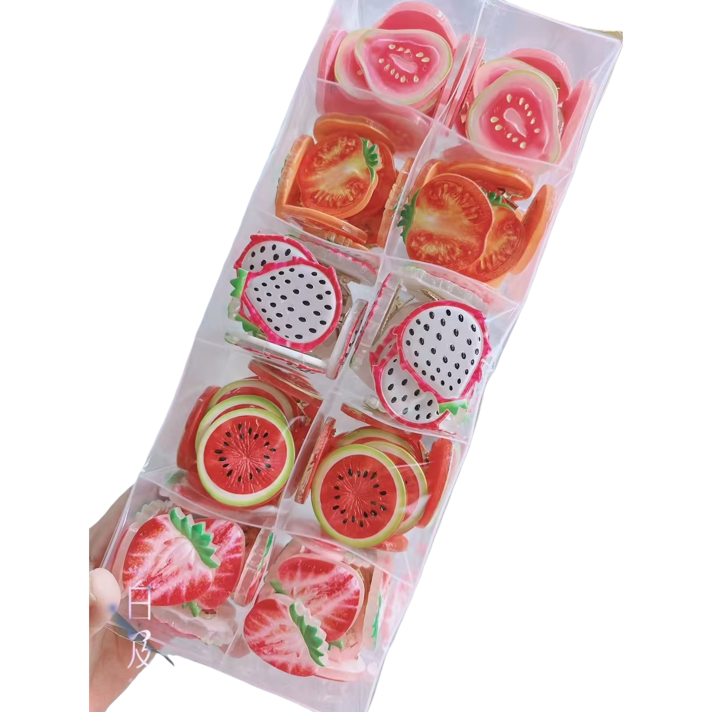 Transparent compartmentalized storage box with colorful fruit-shaped children's hairpins Item Picture