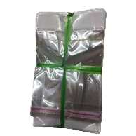 أكياس بلاستيكية شفافة ذات أحزمة خضراء، أكياس بلاستيكية أخرى مربوطة Item Picture