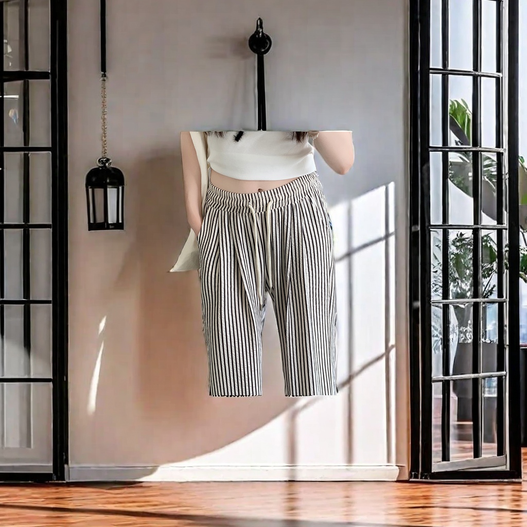 The new summer 2024 women's casual pants feature a black and white vertical stripe design, loose wide-leg pants, and French long pants with a strong drape, setting a new trend in casual fashion