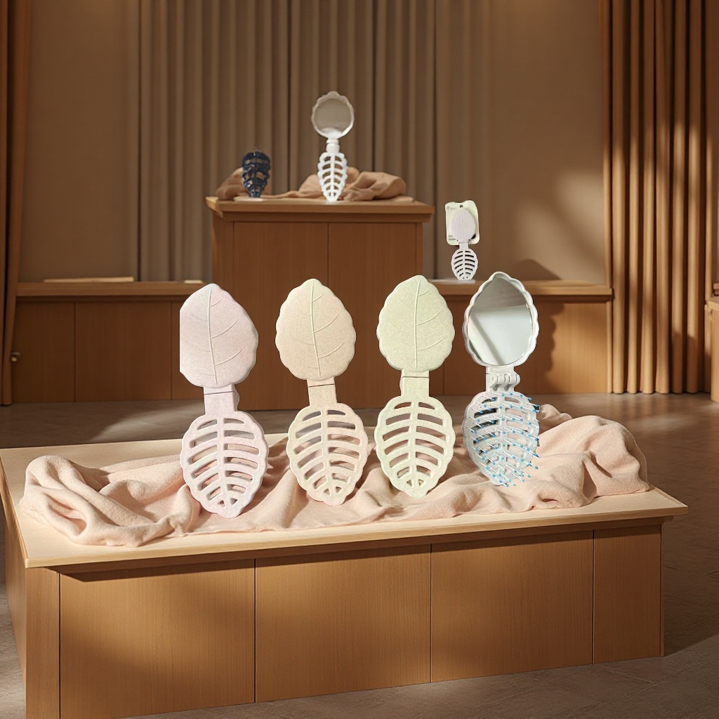 Portable leaf-shaped mirror and comb dual-purpose creative folding portable comb, makeup mirror, essential travel mirror with comb, small items for street vending details Picture