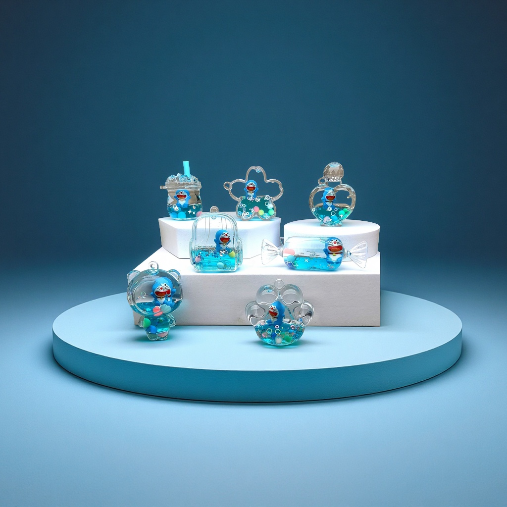 Creative acrylic oil-impregnated sand bottle, blue cartoon keychain, perfume, car accessories, desktop ornaments and ornaments