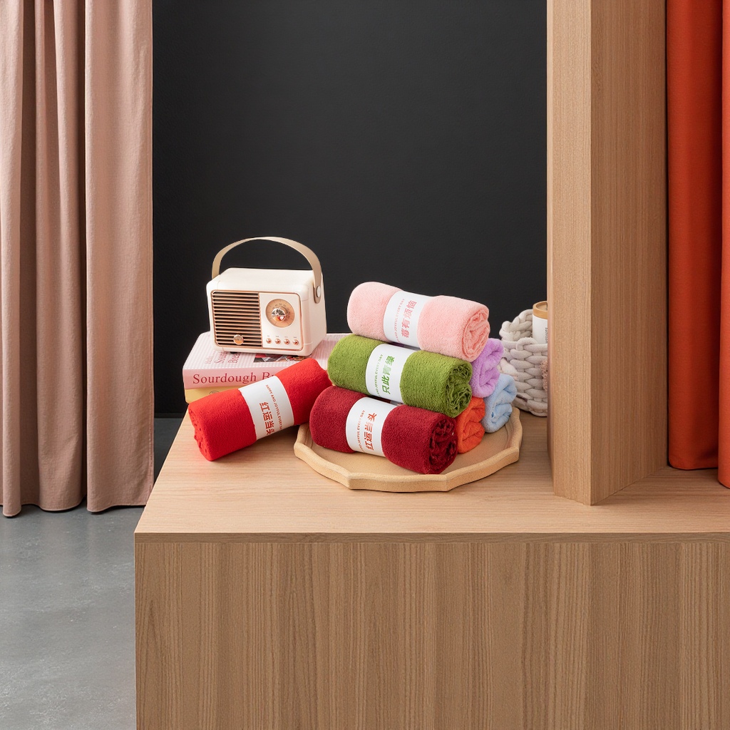Coral fleece towel as a souvenir, a business festival, wedding return gift, with a waist cover and pen holder inside the towel Application Scenario