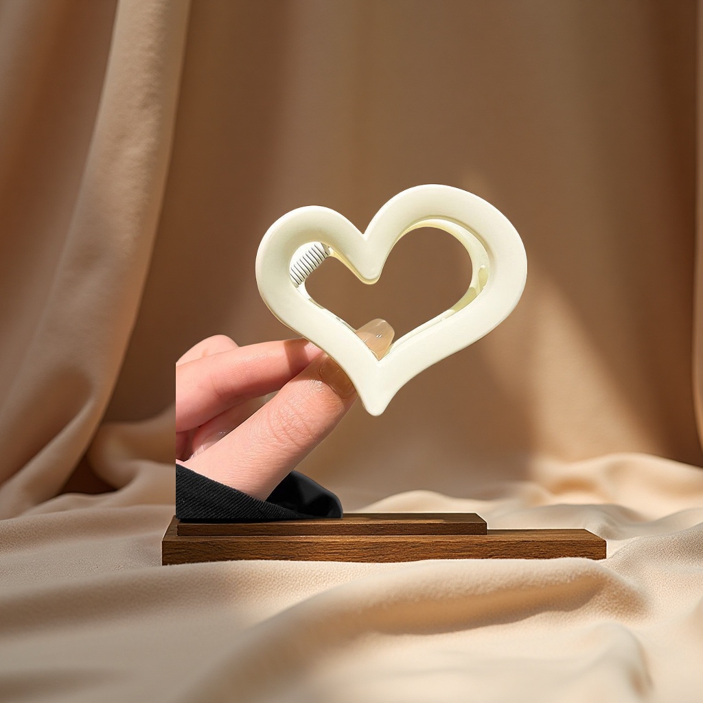 25年奶咖四色镂空发夹后脑勺盘发抓夹百搭爱心形简约头饰发饰品白底实物图