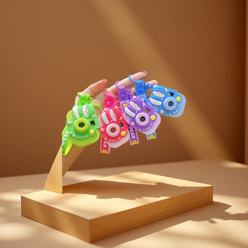 Cute cartoon red panda, projection camera, keychain, creative car bag, pendant, key chain, small gifts, wholesale accessories Specification image