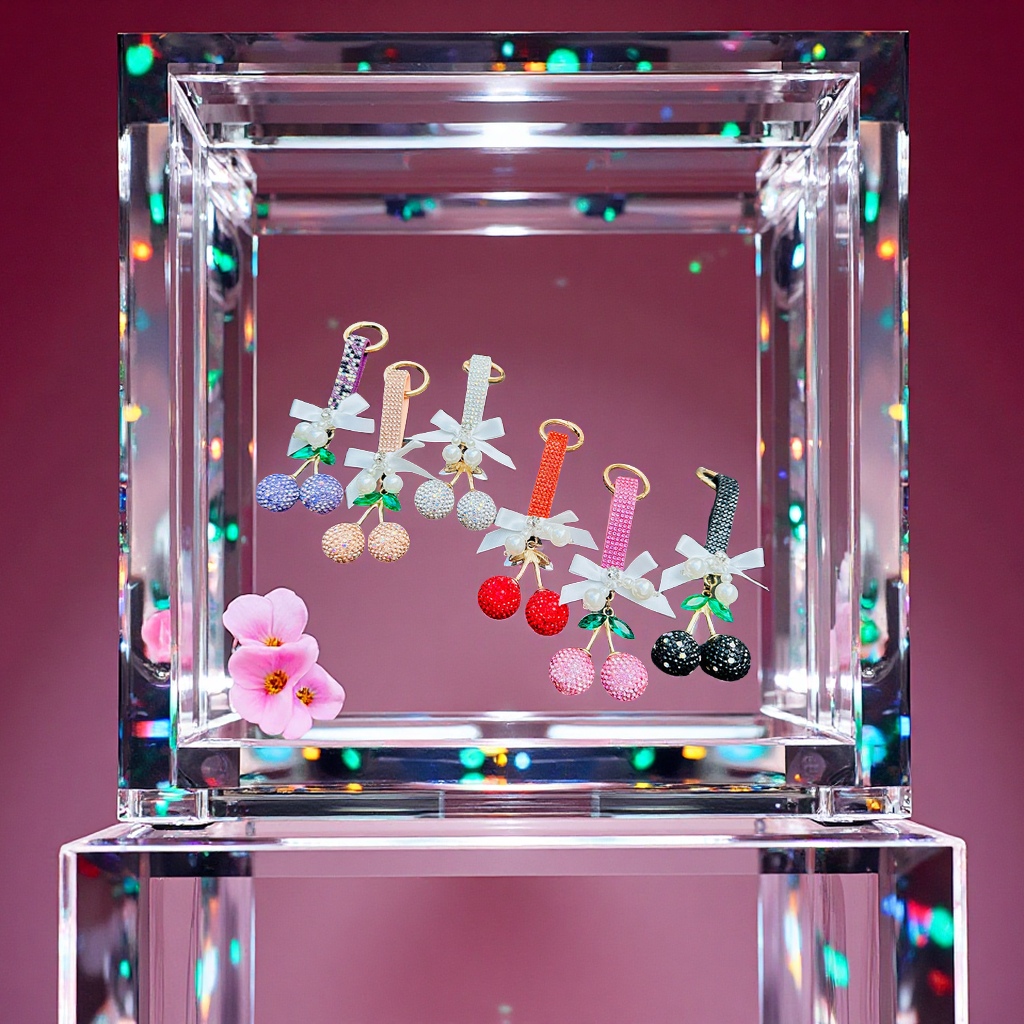 Factory wholesale of diamond-encrusted cherry keychains, cute and personalized bags, pendants, car key chains, colorful accessories and car ornaments Application Scenario