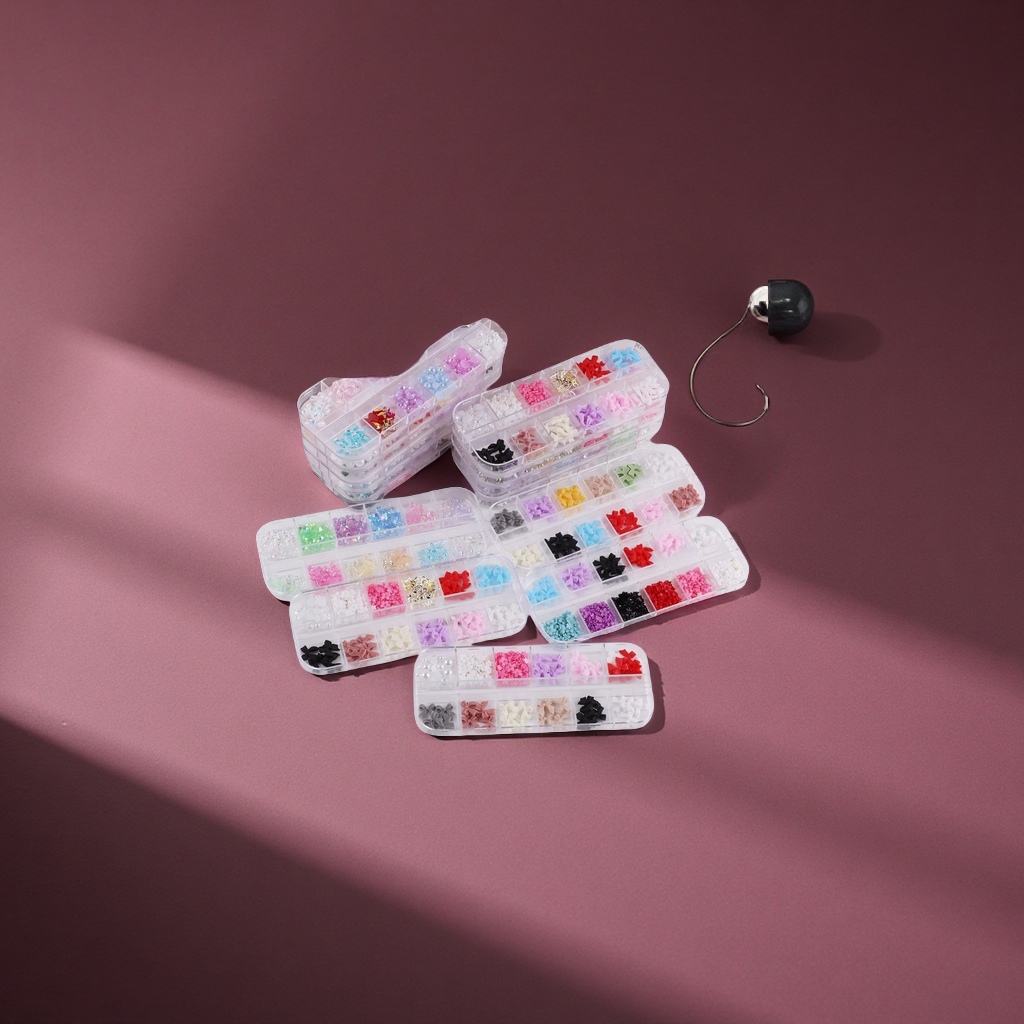 欧美热销12格蝴蝶结领结珍珠五瓣花金属蝴蝶美甲饰品首饰箱收纳包