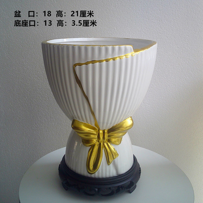 2025新款创意简约喜庆红色陶瓷花盆网红家居客厅桌摆装饰盆栽盆白底实物图