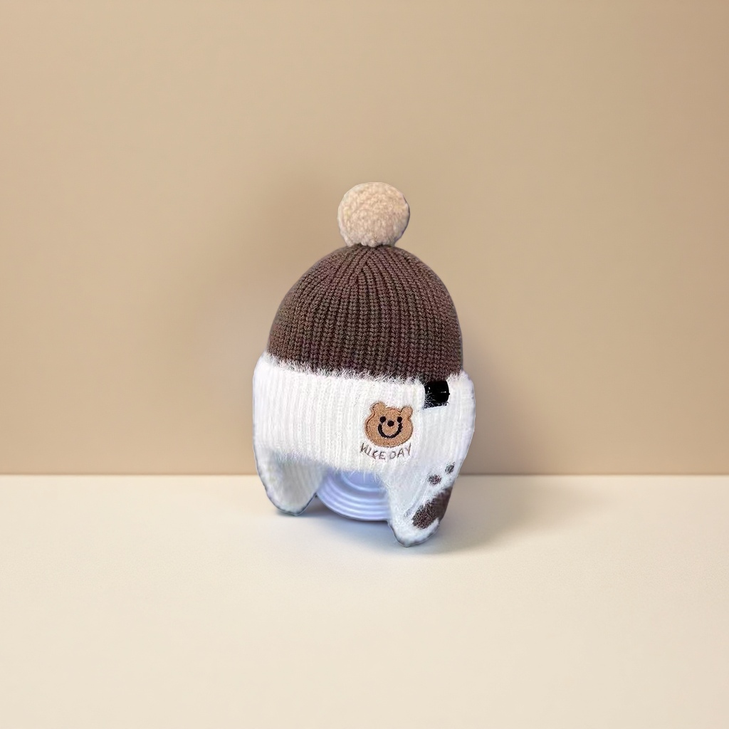 The new autumn and winter children's warm hats are trendy and cool. The little bear is cute. The baby pullover hat and the thickened woolen hat protect the ears Specification image
