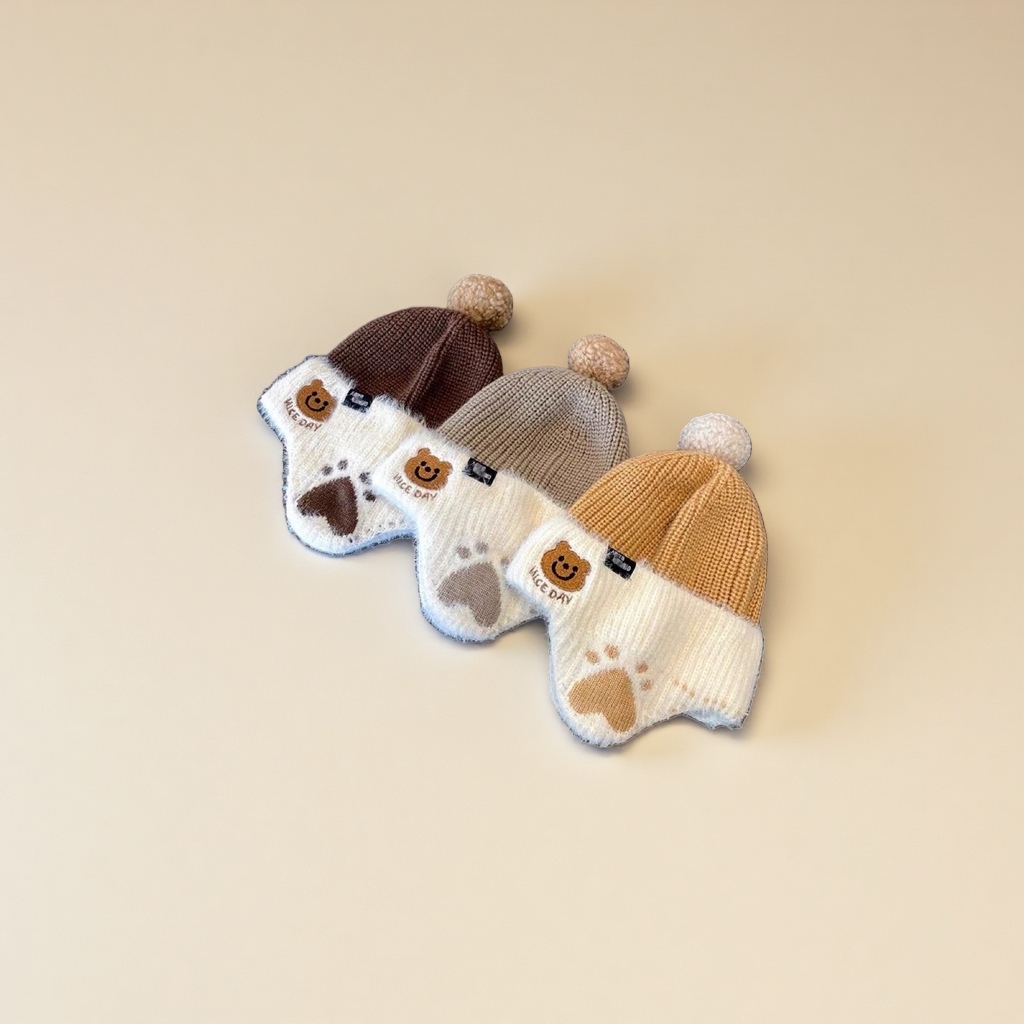 The new autumn and winter children's warm hats are trendy and cool. The little bear is cute. The baby pullover hat and the thickened woolen hat protect the ears Application Scenario