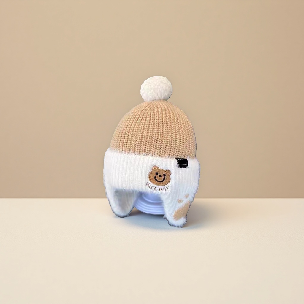 The new autumn and winter children's warm hats are trendy and cool. The little bear is cute. The baby pullover hat and the thickened woolen hat protect the ears details Picture