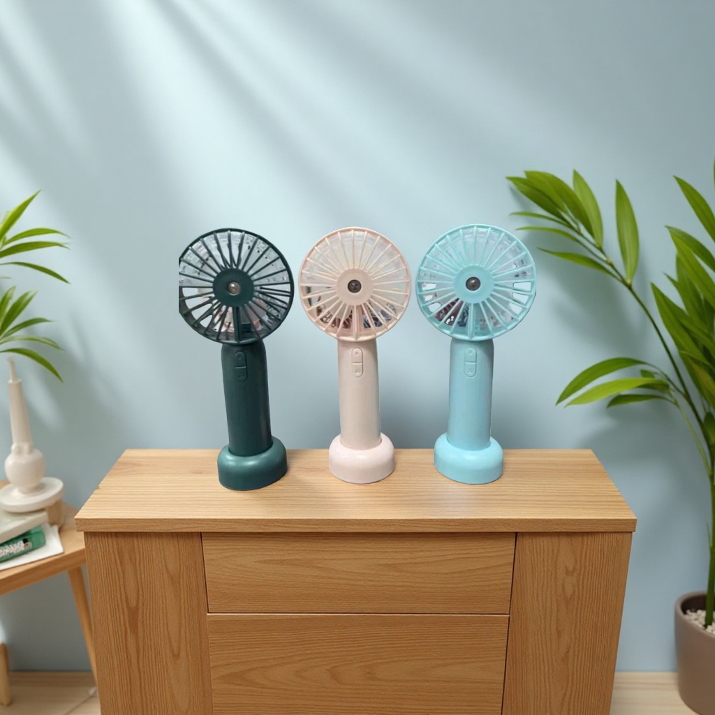 Handheld spray hydrating fan, usb charging portable desktop, mini spray fan for student dormitories Application Scenario