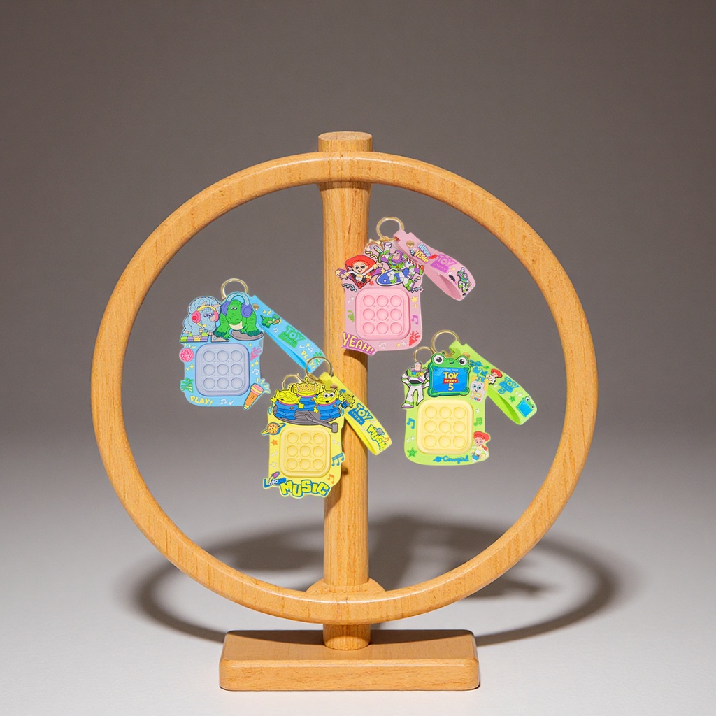 The official Disney Story Press Button sound, rotatable, educational and stress-relieving toy, schoolbag pendant, keychain