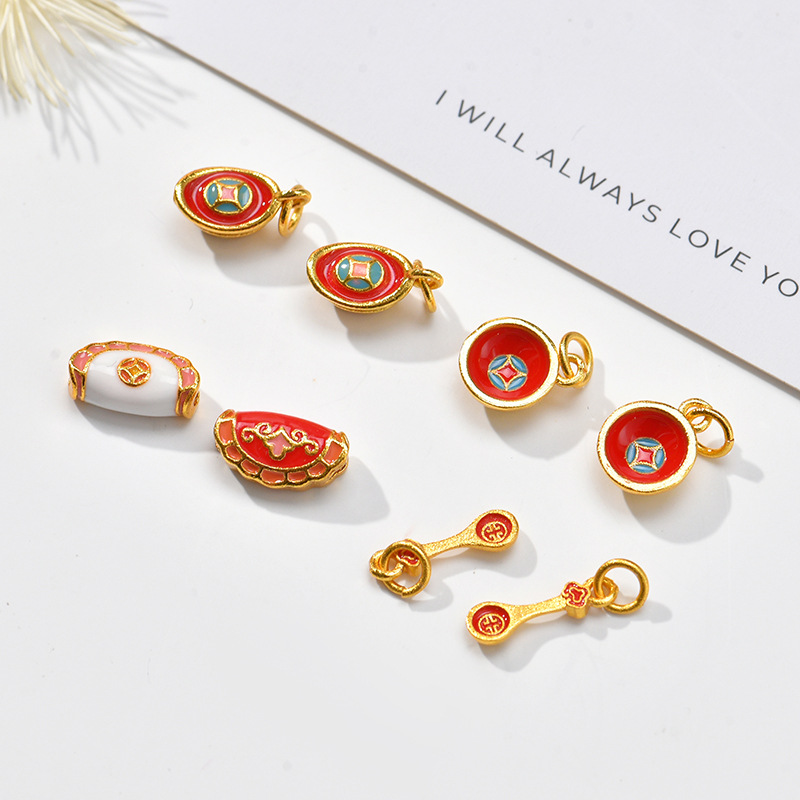 Wholesale of fashionable handcrafted accessories such as sand gold color-preserving blue oil-dripping small pendants, gold ingots, gold spoons and gold bowls