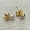 Light luxury micro-inlaid zircon bow ribbon pearl earrings, elegant and fashionable stud earrings, women's style Application Scenario