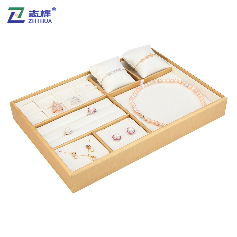 Direct sales from the manufacturer of gold-edge white-faced jewelry display stands, multi-functional jewelry trays, storage boxes and jewelry packaging products