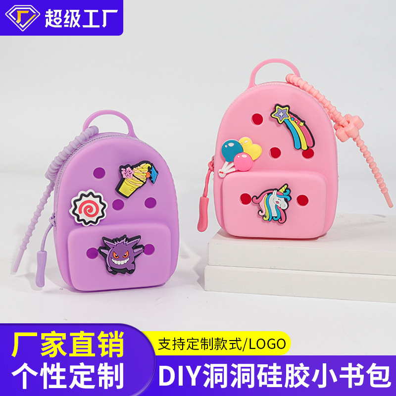 DIY hole-hole silicone mini schoolbag, children's coin purse, creative headphones, storage, keychain, pendant, accessories