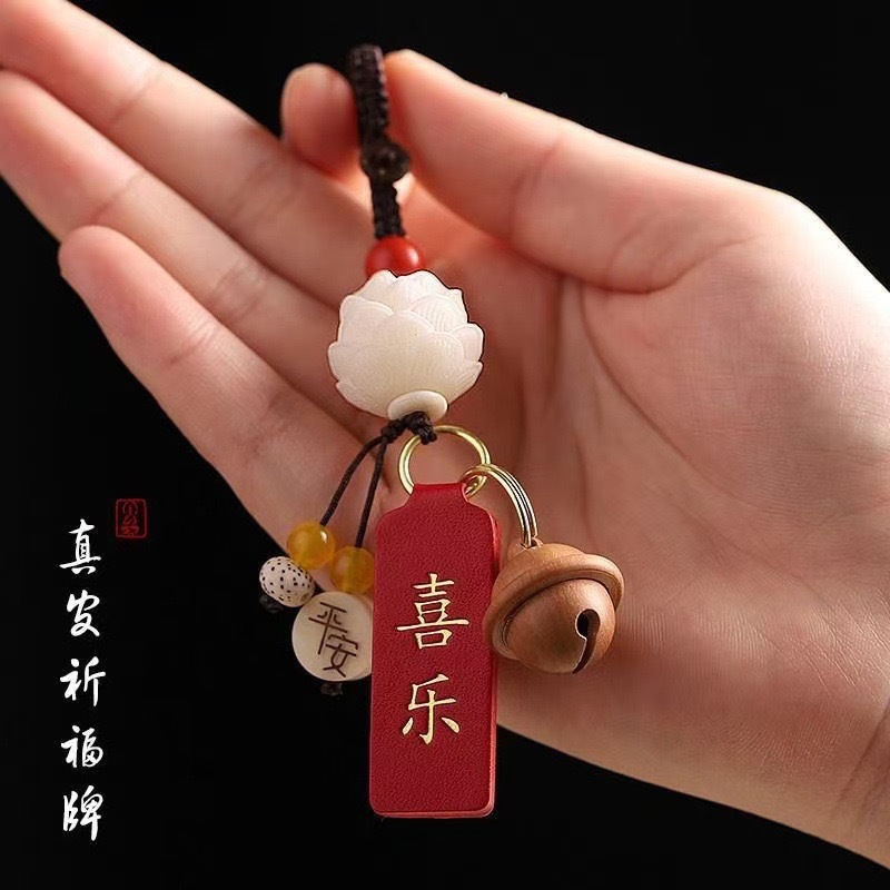 The new car pendant, the Bodhi lotus pendant, is the same popular style as the peace and joy charm rearview mirror pendant Specification image