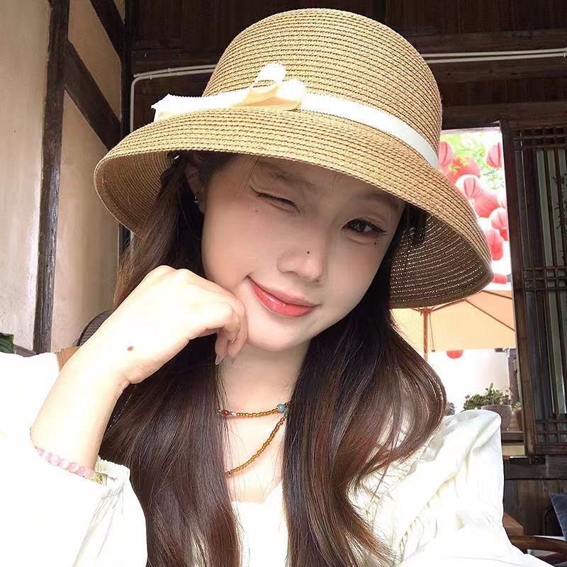 法式赫本风蝴蝶结草编渔夫帽夏季度假防晒帽子女显脸小轻便百搭款