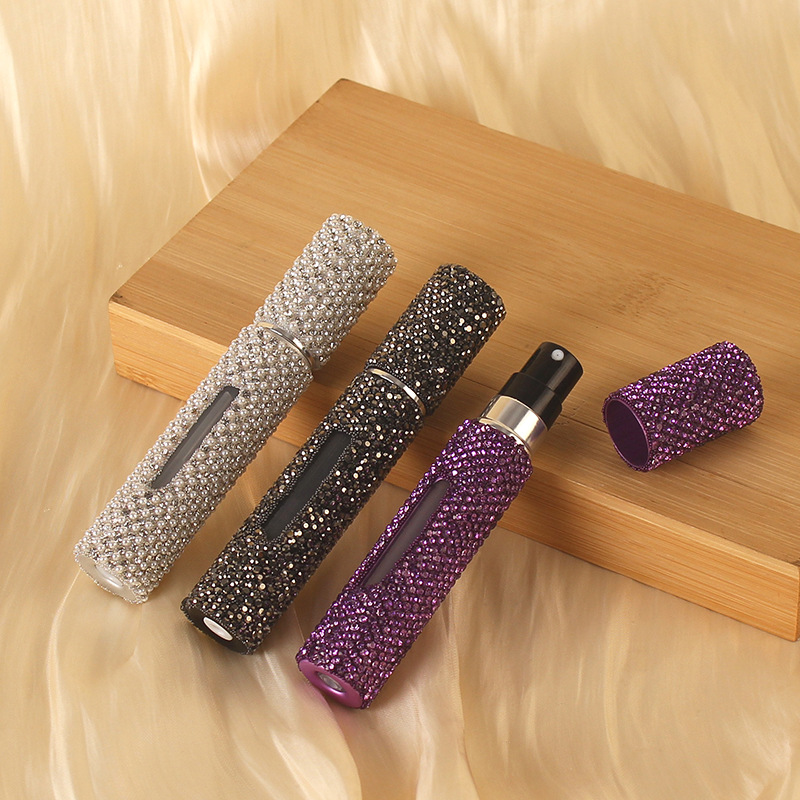 Cross-border diamond-encrusted 8ml perfume sub-bottle bottom self-pump portable spray high appearance level filling bottle beauty and daily chemical packaging Application Scenario