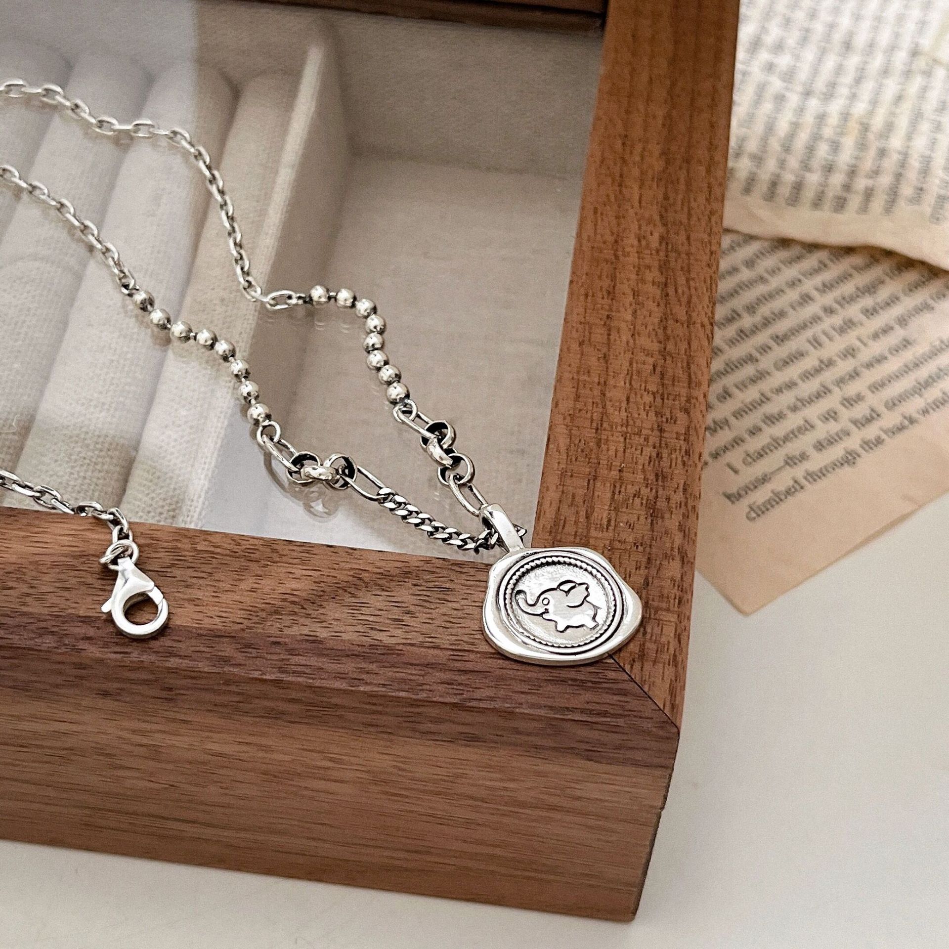 唐卡/不锈钢吊坠/恶魔之眼/和田玉无事牌/玻璃饰品产品图