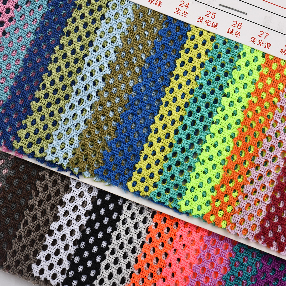 The manufacturer has in stock all polyester rocking basket mesh warp knitted round hole mesh fabric for office chairs, baby strollers, handbags and luggage Application Scenario