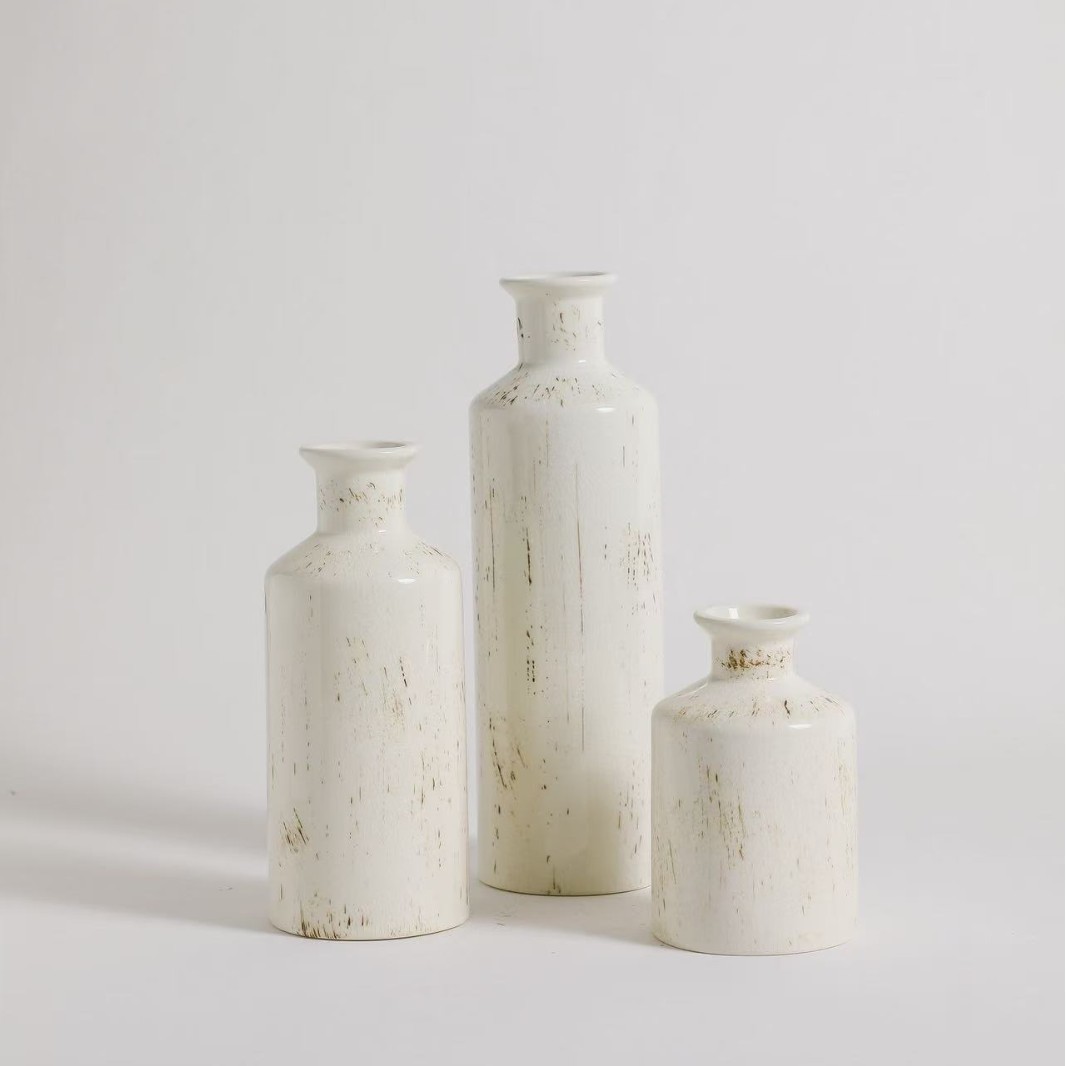 Jarrón de cerámica de estilo europeo objetos de artesanía jarrón de oro para el hogar rosa floral decoración de la sala de estar tres jarrones de viento vintage blanco details Picture