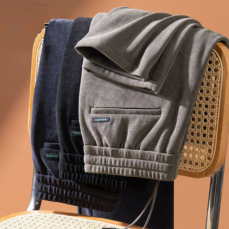 Wholesale of men's corduroy thickened casual pants with elastic waist and straight-leg warm pants. Women's casual pants
