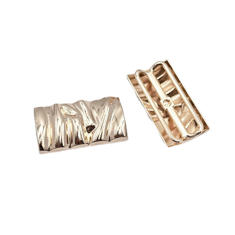Factory direct sales of zinc alloy silk scarf buttons for women's irregular-shaped clothing accessories and swimsuits, chest buttons Item Picture
