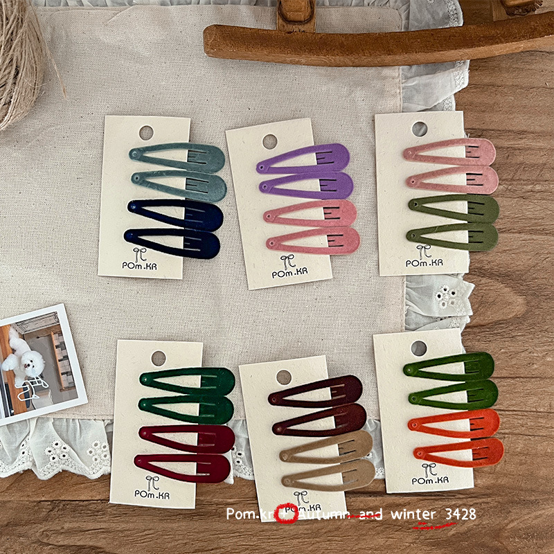 Colorful water drop velvet clips, a versatile and sweet hair clip for girls, a fresh and retro style wholesale women's hair accessory Application Scenario