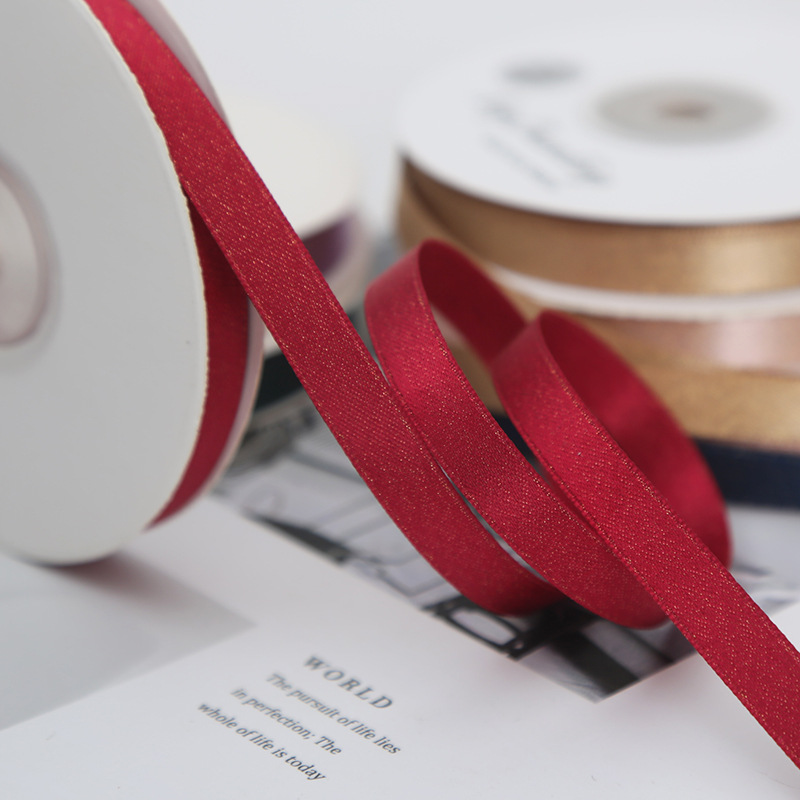 Gold thread ribbon, webbing, gold weft ribbon, satin ribbon, bow, DIY handmade cake baking, gift packaging materials, clothing accessories, scarves, silk scarves, sun-protective clothing, sash, 0.9cm Application Scenario