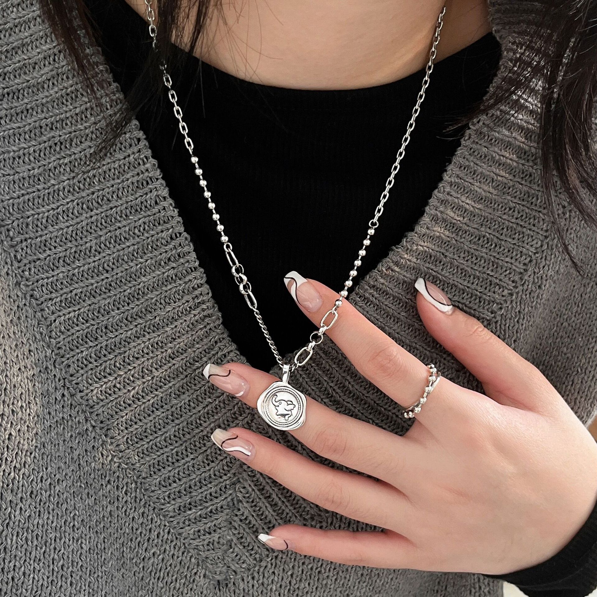 唐卡/不锈钢吊坠/恶魔之眼/和田玉无事牌/玻璃饰品细节图