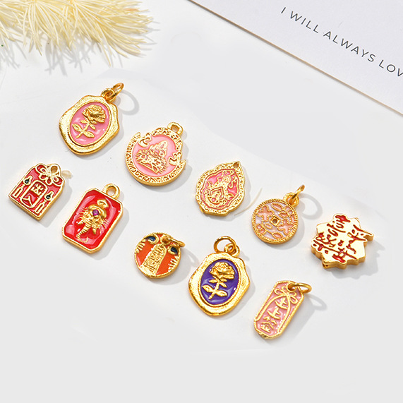 Wholesale of DIY bracelets, necklaces, accessories and other accessories made of traditional Chinese style copper oil-dripping beads, pearl ingot pendants