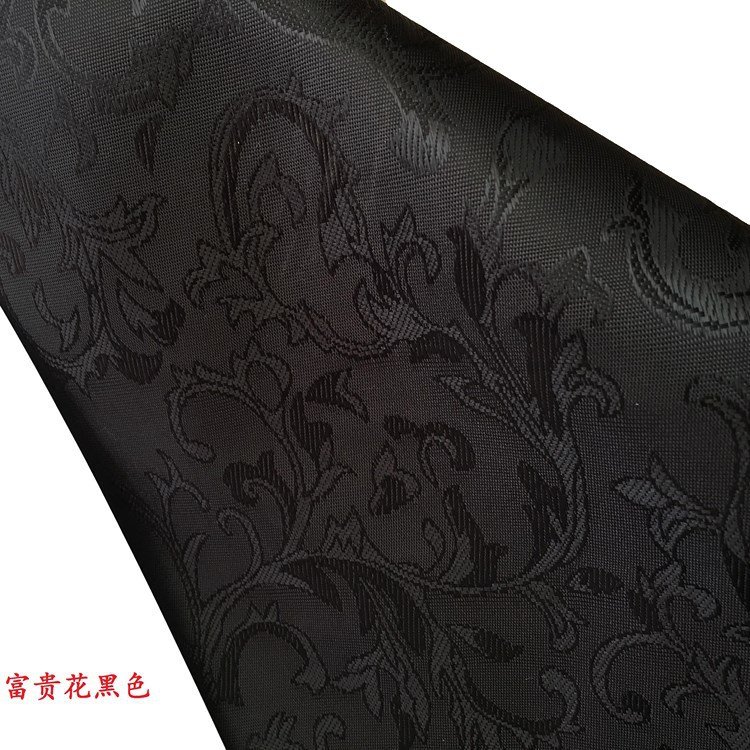 国潮黑底小红花提花布料布匹黑色人丝小草花鞋材服装面料提花布面料详情12